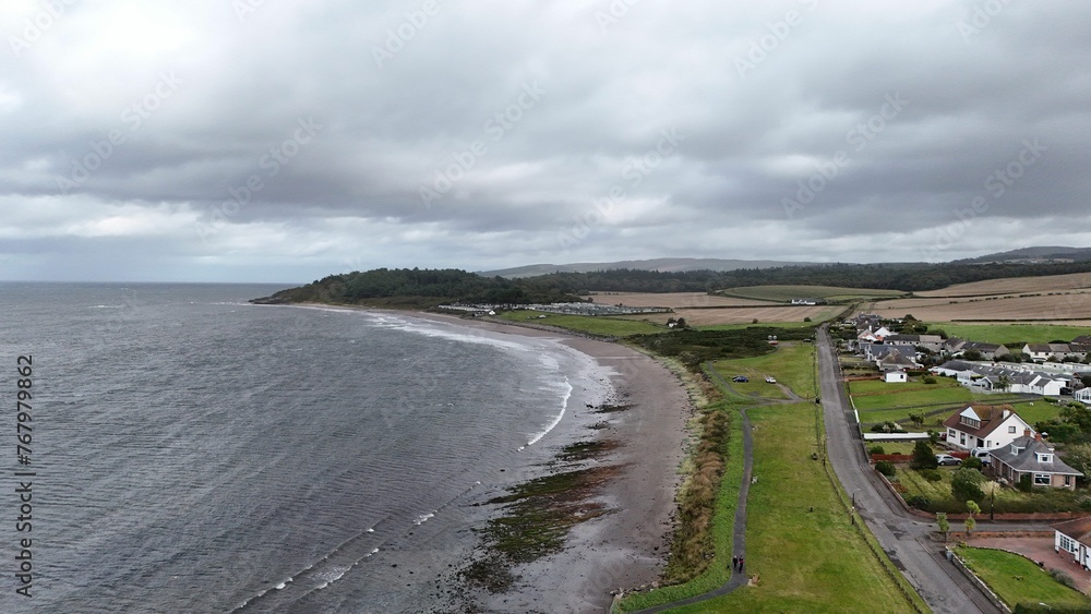 Aerial view of Maidens, Ayrshire, Scotland with a lush green grassy area Aerial view of Maidens, Ayrshire, Scotland with a lush green grassy area