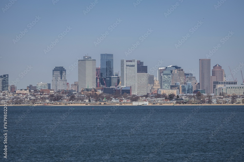 Stunning aerial view of the Boston city skyline with Boston harbor in the foreground Stunning aerial view of the Boston city skyline with Boston harbor in the foreground