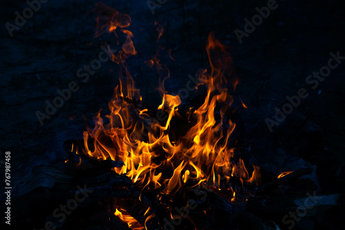 Bonfire flames on a black background. The concept of memory  mysticism.
