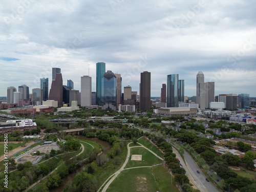 Downtown Houston, Texas skyline with traffic in the background on a busy freeway © Gage