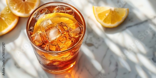 close up shot of a glass of ice LEMON TEA on a modern coster