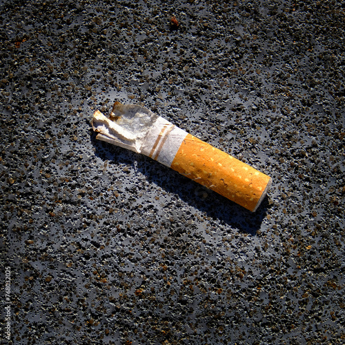 Old Cigarette Butt on Concrete Textured Dirty