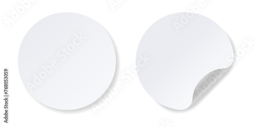 Realistic white round stickers with folded corner. photo