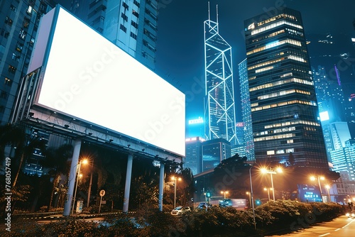 Blank billboard ready for new advertisement in big city with skyscrapers, night time, Generative AI