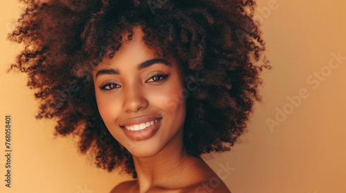 Beautiful african american young woman with afro hairstyle .