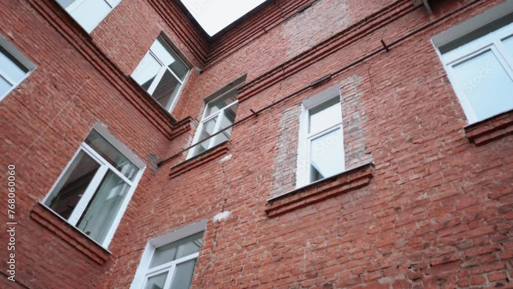old destroyed medical building without repair with red brick crack old destroyed medical building without repair with red brick crack