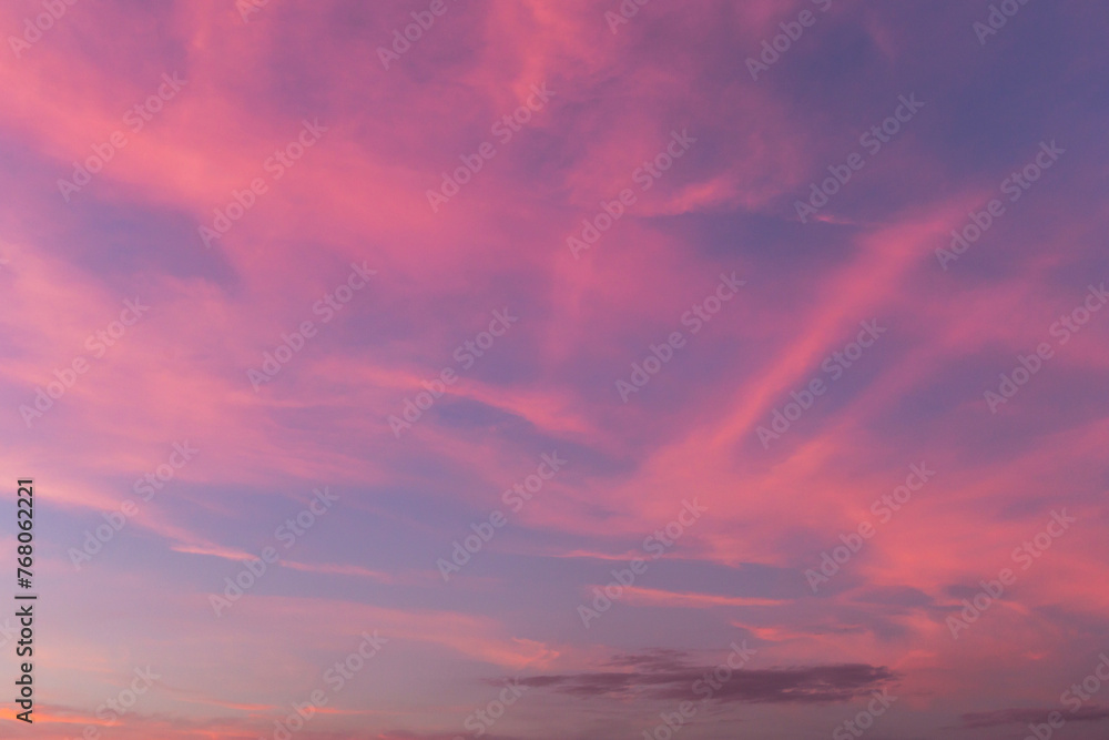 Pink purple violet blue cloudy sky. Beautiful epic sunrise, sunset with cirrus clouds abstract background texture