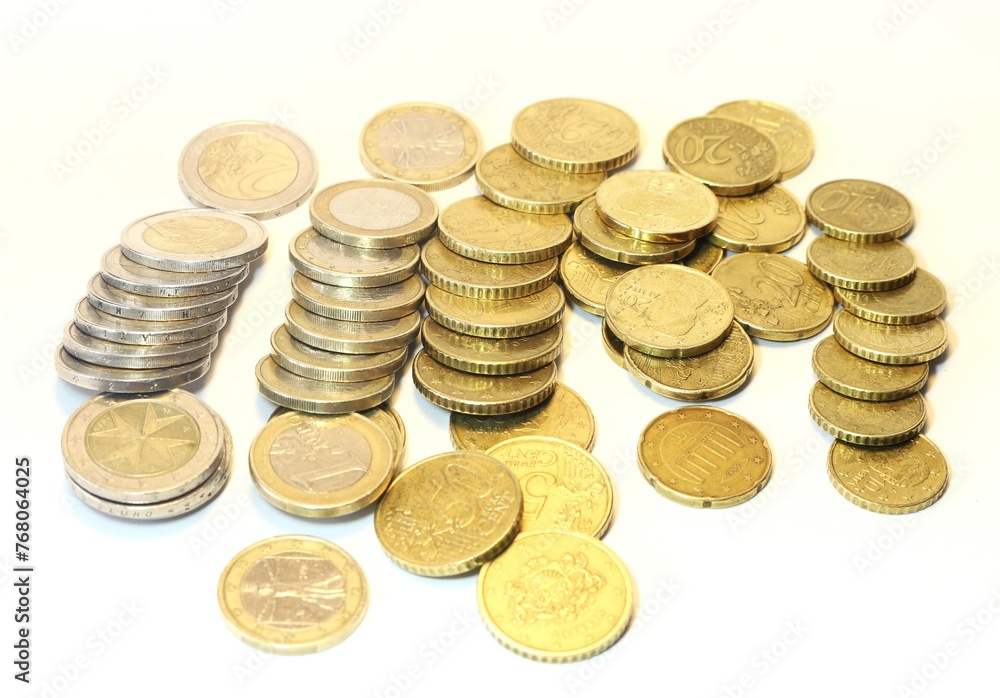 Isolated Wealth: Piles of Euros Amid Economic Flux Isolated Wealth: Piles of Euros Amid Economic Flux