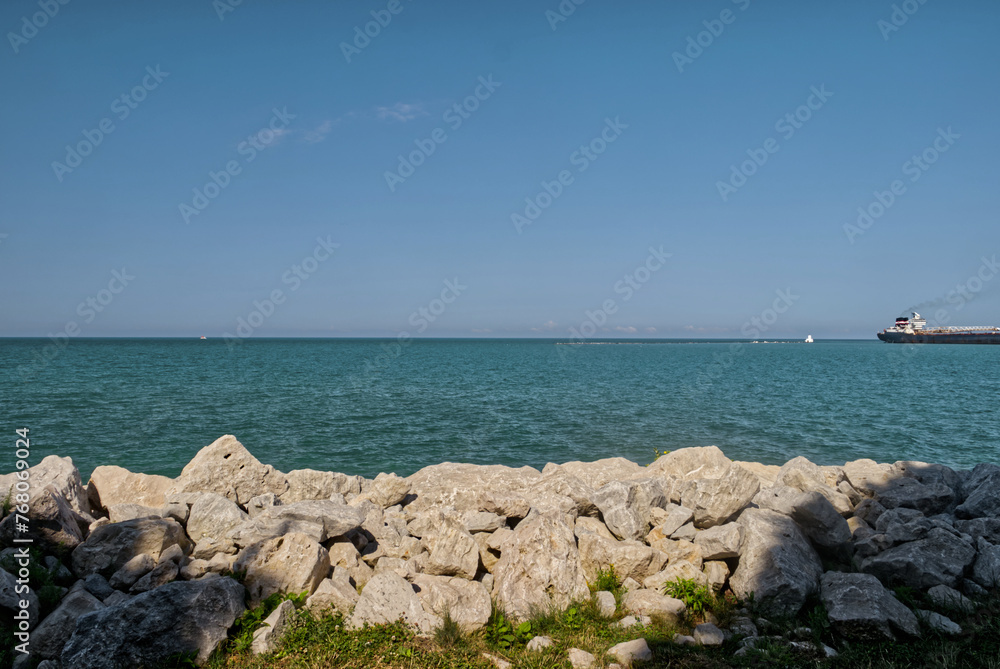 The beautiful Huron lake seen from the beach behind the rocks - Goderich, ON, Canada