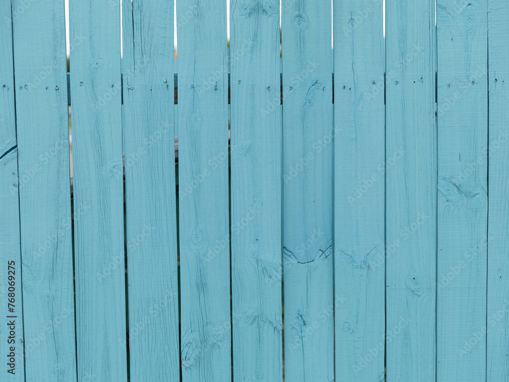 Wooden Fence painted bright blue Wooden Fence painted bright blue
