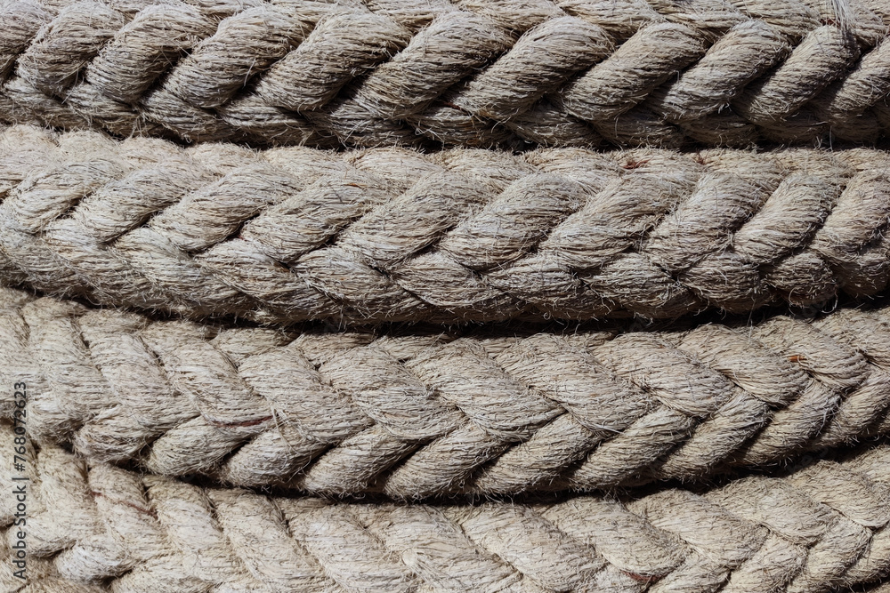twisted braided rope closeup for natural textile background twisted braided rope closeup for natural textile background