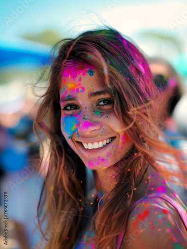 Vibrant expression: a girl's delightful Holi painted face
