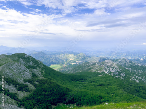 Lovcen national park aerial landscape with clouds in the mountains at summer view