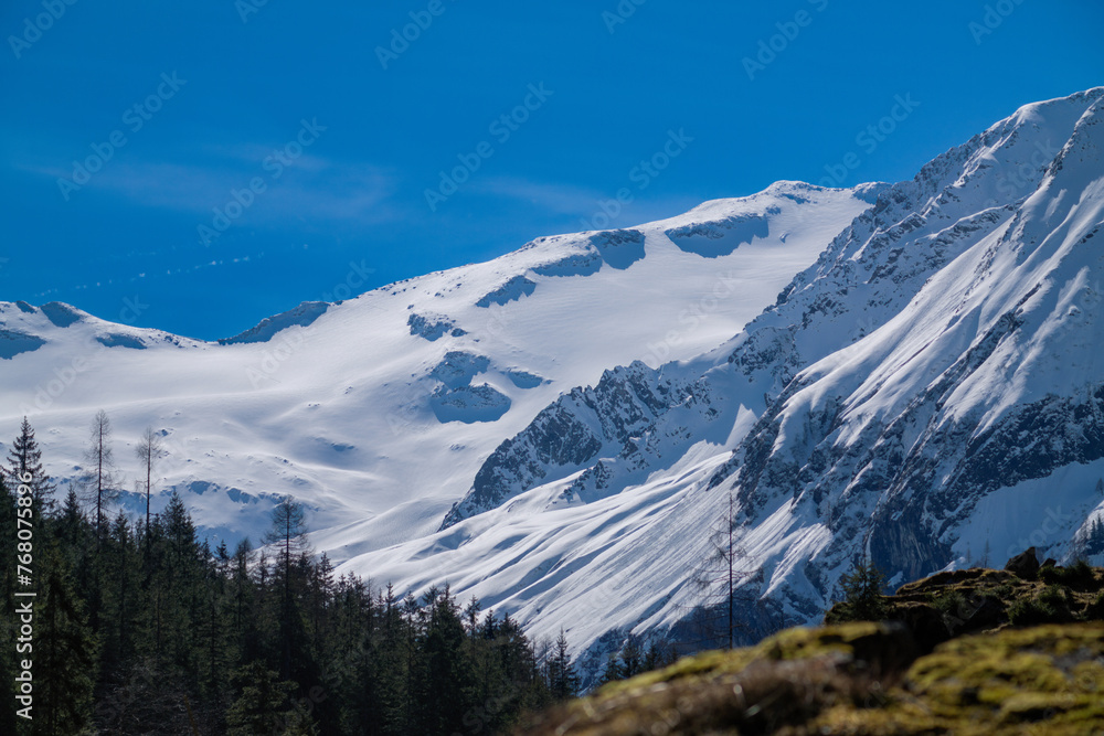 out in nature - wandering in the beautiful alps, the hohen tauern in the national park austria, at a sunny spring day