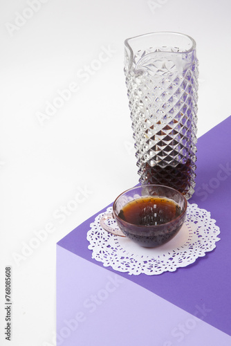 jug fake crystal and cup of coffee 3D illusion