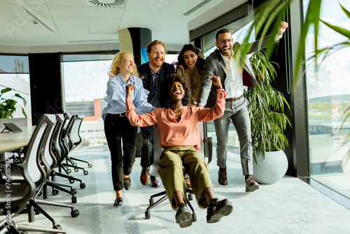 Joyful Office Colleagues En...