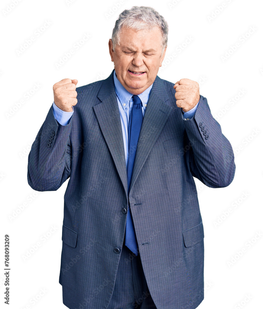 Senior grey-haired man wearing business jacket excited for success with arms raised and eyes closed celebrating victory smiling. winner concept. Senior grey-haired man wearing business jacket excited for success with arms raised and eyes closed celebrating victory smiling. winner concept.