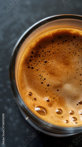Close-Up View of Freshly Brewed Espresso in a Cup © slonme