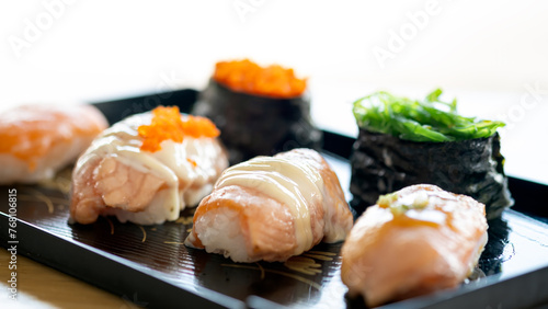 Elegant Sushi Selection with featuring creamy toppings and fresh garnishes Toppings