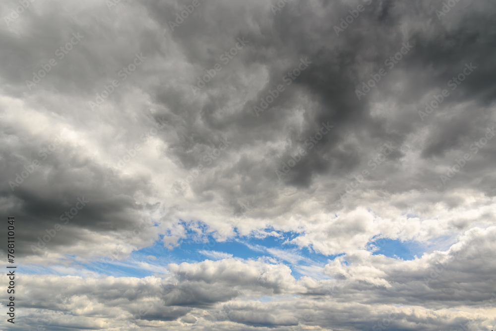 Fototapeta premium Photo of some white light clouds and cloudy blue sky landscape.