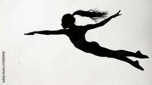 A graceful gymnast mid-air, executing a perfect split leap, their silhouette captured against a pristine white backdrop.