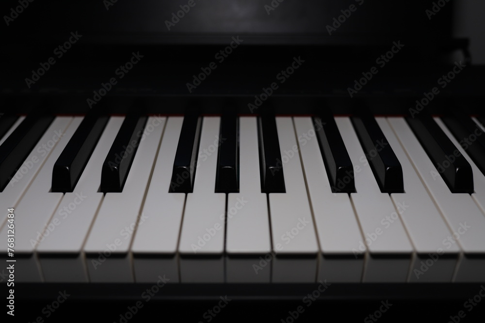 Piano keyboard close-up. Hammer effect of a piano keyboard. Piano keyboard close-up. Hammer effect of a piano keyboard.