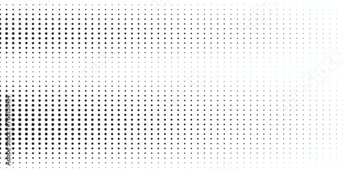 Basic halftone dots effect in black and white color. Halftone effect. Dot halftone. Black white halftone.Background with monochrome dotted texture. Polka dot pattern template. photo