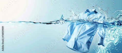 wash clothes in the washing machine Splashed water wave in clean blue water photo