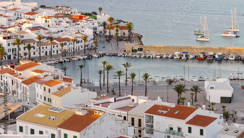 Cuadro en lienzo Top view panorama of the stylish Fornells harbor in warm light of sunset in Meno