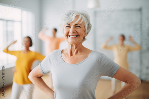 Elderly fitness enthusiasts staying vibrant as they exercise together in the gym, old women practicing yoga © ammad