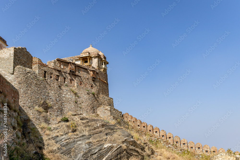 isolated ancient fort stone wall with unique architecture with bright blue sky at morning