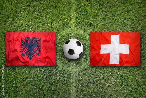 Albania vs. Switzerland flags on soccer field