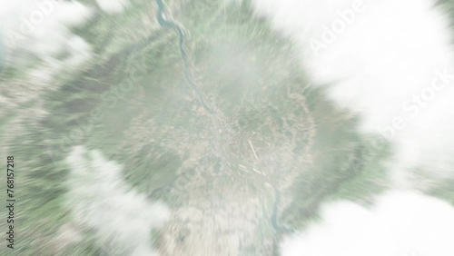 Earth zoom in from space to Ban Houayxay, Laos. Followed by zoom out through clouds and atmosphere into space. Satellite view. Travel intro. Images from NASA photo