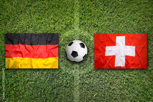 Germany vs. Switzerland flags on soccer field
