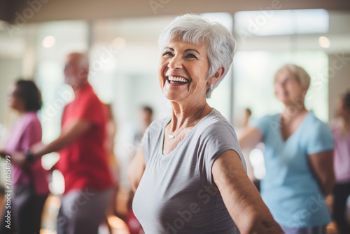 Elderly fitness enthusiasts staying vibrant as they exercise together in the gym  old women practicing yoga