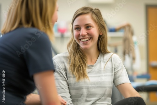 Two women engaged in a conversation in a room, actively exchanging ideas and thoughts, Visualize a patient smiling after the completion of a successful physical therapy, AI Generated
