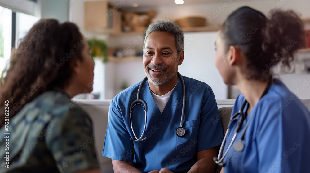 Captured from below, a young healthcare worker engages in conversation with a mature couple in their home, the scene radiating warmth. Captured from below, a young healthcare worker engages in conversation with a mature couple in their home, the scene radiating warmth.