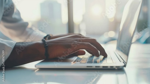 Businessman hands typing on a laptop keyboard with a blurred office background. AI generated image