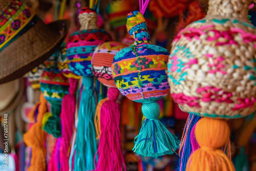 A colorful assortment of Mexican hats and maracas. The hats are of various colors and patterns  and the maracas are also colorful and have different designs. Concept of vibrancy and cultural diversity