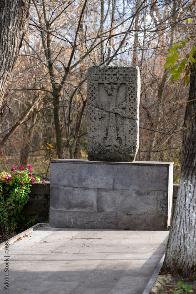 Fototapeta premium An old khachkar (cross-stone) situated in the park, Vanadzor