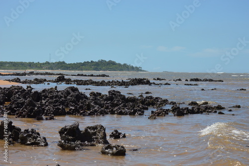 Barrier reef in the blue sea of the beach in Aracruz on the coast of Espírito Santo, Brazil
