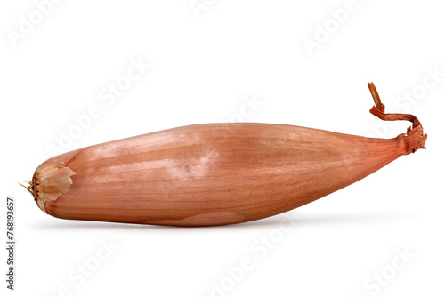 Whole unpeeled banana shallot isolated on white background, side view of a long onion variety photo