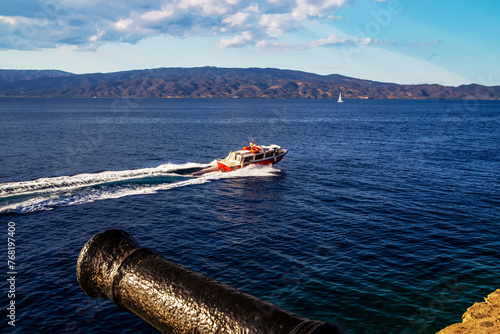 Bild auf Leinwand Motorboat swimming on  high speed in Mediterranean Sea - view from Hydra Greek i