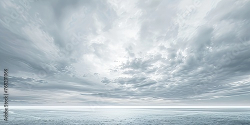 A vast expanse of water under a cloudy sky