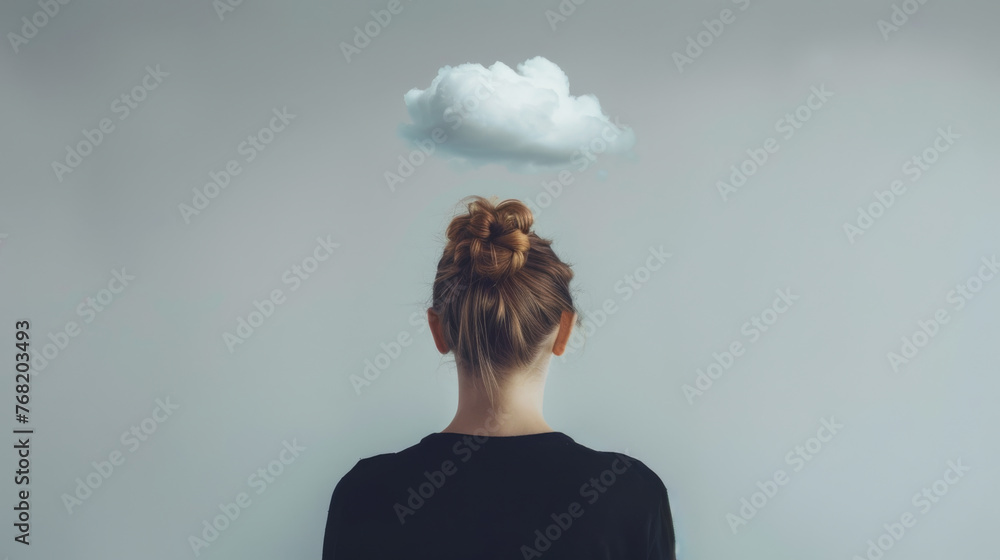 A cloud hovers above the head of a person facing away from the camera.
