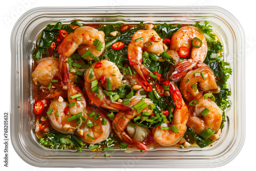 Plastic container with shrimps and vegetables salad inside isolated on transparent background. Top down view. Retail supermarket box with snack.
