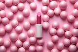 pink lipstick on a cosmetic background. flat lay, top view.