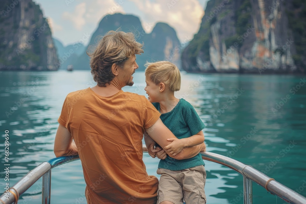 Fototapeta premium The serene moment between a father and son as they sit on a boat embracing the majestic view, evokes a sense of peace and bonding