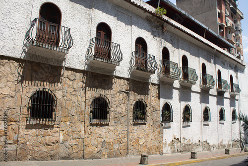 Traveling through Venezuela, traditional architecture of the tascas in Caracas. Facade with colonial windows