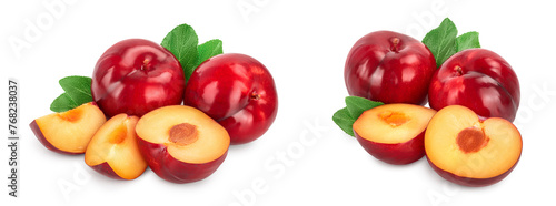 fresh red plum and slice with leaves isolated on white background
